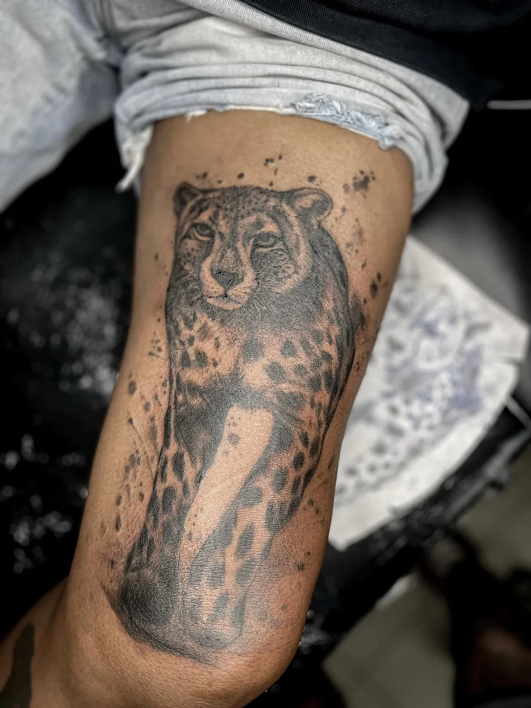 Black and grey realism tattoo by Cash
